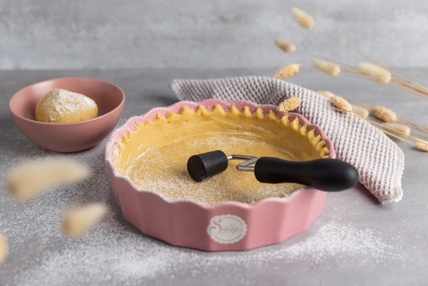 Sallys Backform- und Pizzateigroller